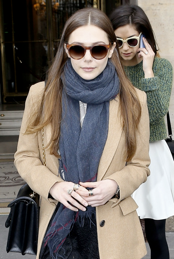 OLSENS ANONYMOUS ELIZABETH LIZZIE OLSEN OLSEN LITTLE SISTER FASHION STYLE BLOG PARIS FASHION WEEK FW 2013 ROUND TORT SUNGLASSES CAMEL JACKET SCARF TEXTURED BLACK MAXI SKIRT THE ROW BAG PONYHAIR FLAT LOAFER SLIPPERS STACKED RINGS 