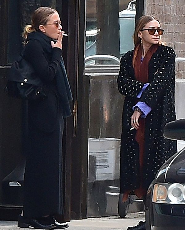 Olsens Anonymous Blog Mary Kate And Ashley Olsen Smoke Break In New York City Fall Layers Scarf Coat Skirt Loafer Cigarette Close Up Candid Cut Out Coat photo Olsens-Anonymous-Blog-Mary-Kate-And-Ashley-Olsen-Smoke-Break-In-New-York-City-Fall-Layers-Scarf-Coat-Skirt-Loafer-Cigarette-Close-Up.jpg