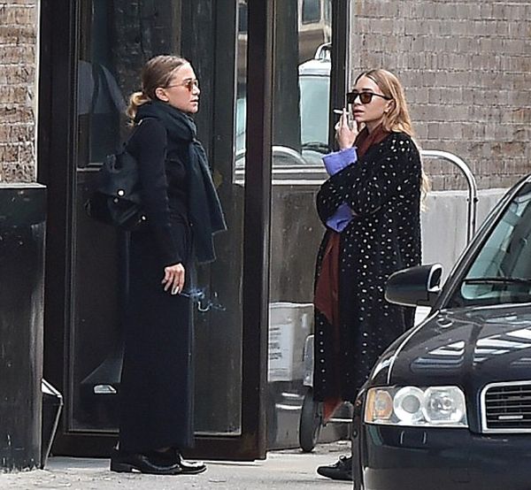 Olsens Anonymous Blog Mary Kate And Ashley Olsen Smoke Break In New York City Fall Layers Scarf Coat Skirt Loafer Cigarette Far Shot Candid Hair Up photo Olsens-Anonymous-Blog-Mary-Kate-And-Ashley-Olsen-Smoke-Break-In-New-York-City-Fall-Layers-Scarf-Coat-Skirt-Loafer-Cigarette-Far-Shot.jpg
