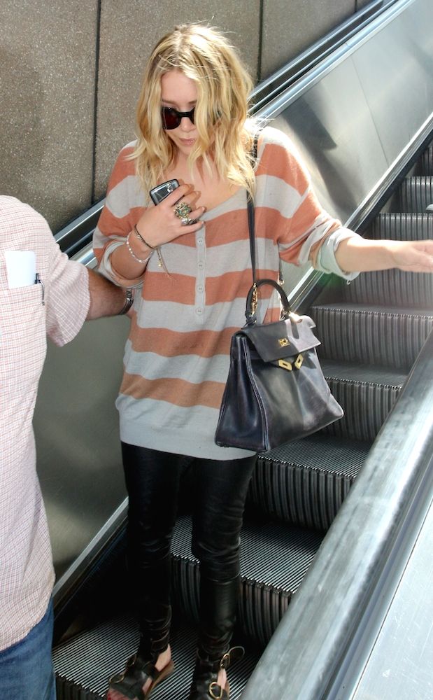 Olsens Anonymous Blog Mary Kate Olsen Airport Look Stripes And Leather Lax Airport Buckle Gladiator Sandals Hermès Bag Candid Sweater Sunglasses Soft Wavy Hair Inspiration photo Olsens-Anonymous-Blog-Mary-Kate-Olsen-Airport-Look-Stripes-And-Leather-Lax-Airport-Buckle-Gladiator-Sandals-Herme3000s-Bag.jpg