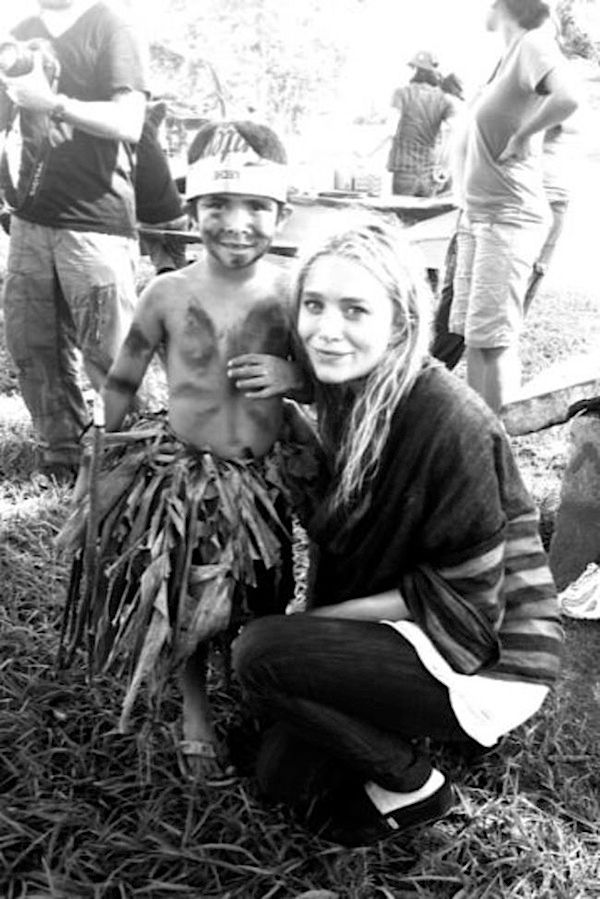 Olsens Anonymous Blog Mary Kate Olsen Charity Trip With Toms Shoes Stripe Wrap Cardign Black And White photo Olsens-Anonymous-Blog-Mary-Kate-Olsen-Charity-Trip-With-Toms-Shoes-Stripe-Wrap.jpg