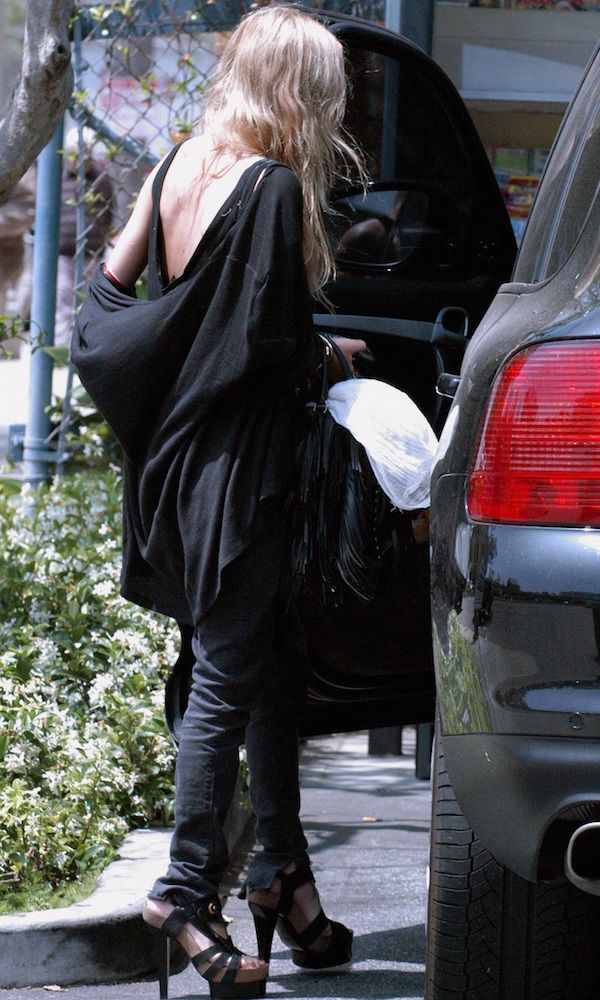 Olsens Anonymous Blog Style Fashion Get The Look Mary Kate Olsen Goes Boho In Black While In LA Necklaces Jeans Fringe Platform Sandals Candid photo Olsens-Anonymous-Blog-Style-Fashion-Get-The-Look-Mary-Kate-Olsen-Goes-Boho-In-Black-While-In-LA-Necklaces-Jeans-Fringe-Platform-Sandals.jpg