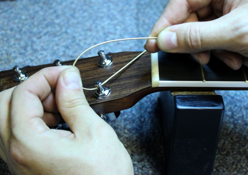 How to restring a steel string acoustic guitar step 06