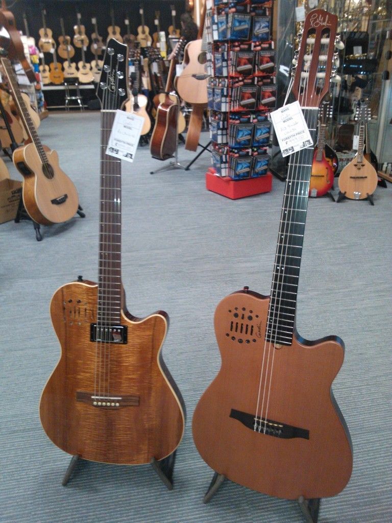 Godin ACS Cedar and A6 Koa Multiac guitars