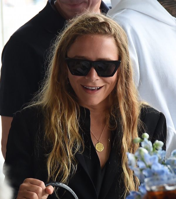Olsens Anonymous Blog Mary Kate Olsen Twins Style Long Wavy Hair Black Sunglasses Round Medallion Necklace Button Up Shirt Smile Coin Pendant