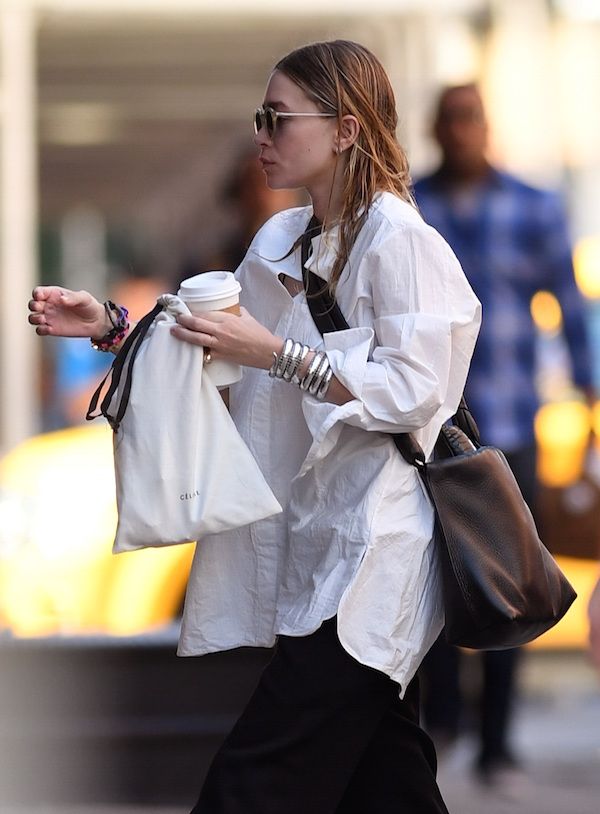 Olsens Anonymous Blog Mary Kate Ashley Olsen Style White Button Down Shirts Wet Hair Coil Snake Bangles The Row Bag Wide Leg Pants Round Sunglasses