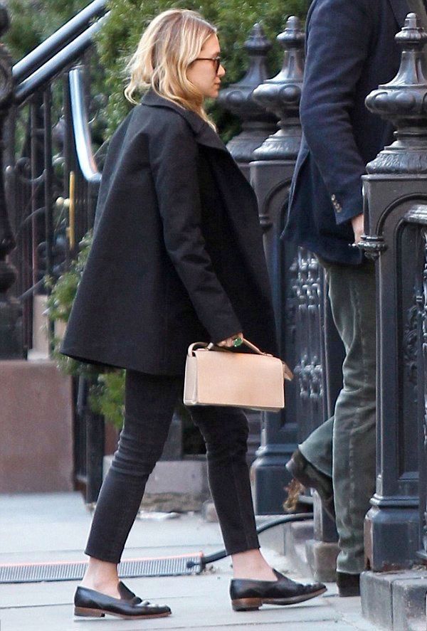 OLSENS ANONYMOUS ASHLEY OLSEN WAVY LONG HAIR BLACK PEACOAT THE ROW NUDE SHOULDER CLUTCH BAG EMERALD AND GOLD RING CROPPED BLACK DENIM JEANS BLACK LOAFERS IN NEW YORK CITY FASHION STYLE BLOG photo OLSENSANONYMOUSASHLEY|NUDEBAGANDLOAFERSINNEWYORKCITY.jpg
