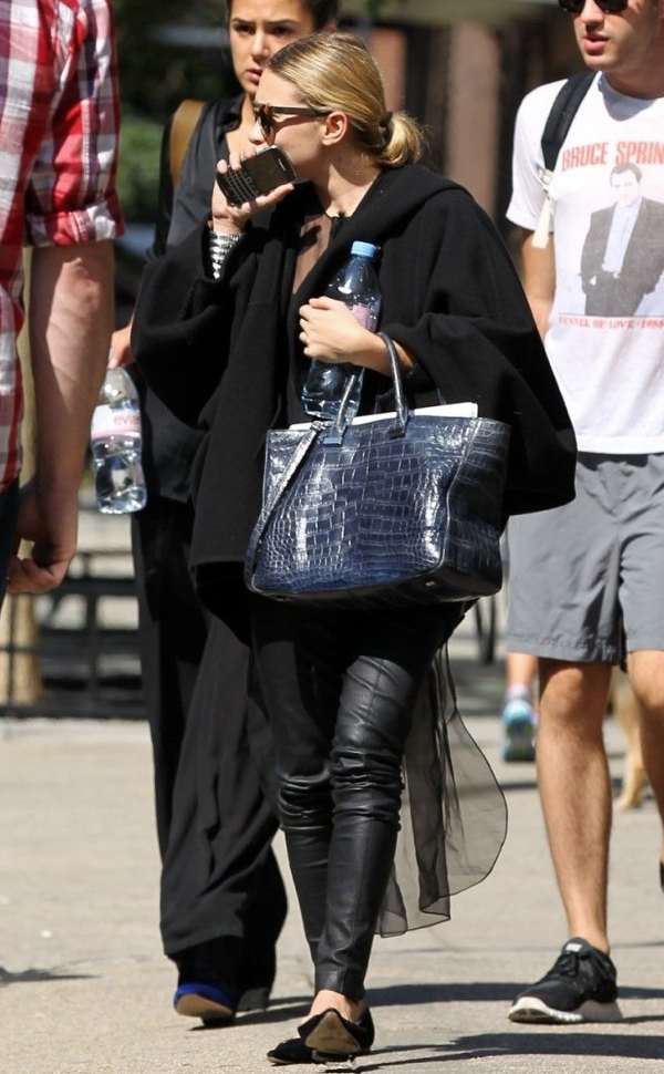 OLSENS ANONYMOUS ASHLEY OLSEN FASHION STYLE BLOG OVERSIZED BLACK SWEATER CARDIGAN SHEER DIP BACK HEM TOP LEATHER PANTS LEGGINGS POINTY TOE SUEDE FLATS BLUE NAVY THE ROW CROC BAG TOTE SIVER CUFF LINDA FARROW FOR THE ROW CAT EYE TORT SUNGLASSES