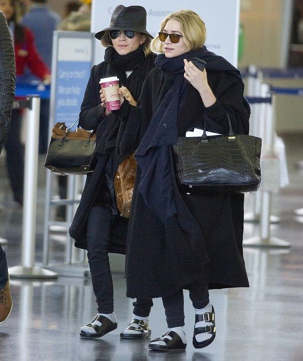 OLSENS ANONYMOUS JFK AIRPORT LOOK MARY-KATE AND ASHLEY OLSEN SOCKS AND SANDALS STRAW HAT AVIATOR SUNGLASSES SCARF LONG BLACK COAT SKINNY BLACK JEANS GREY GRAY SOCKS BIRKENSTOCK INSPIRED SLIDE SANDALS OMBRE PATENT TOTE BAG CROC EMBOSSED THE ROW TOTE BAG FASHION STYLE BLOG 2014 1 photo OLSENSANONYMOUSJFKAIRPORTLOOKMARY-KATEANDASHLEYOLSENSOCKSANDSANDALS1.jpg