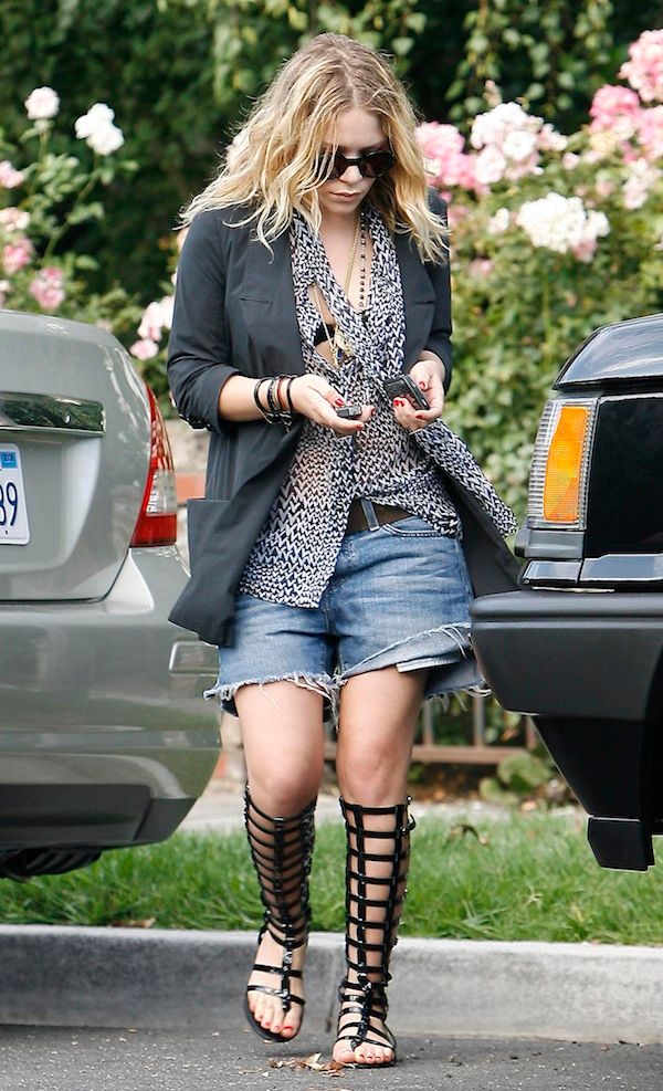 Olsens Anonymous Blog Mary Kate Olsen Graphic Print Top Denim Cut Offs Knee High Gladiator Sandals Graphic Print Sheer Grey Blazer Black Round Sunglasses Red Nails photo Olsens-Anonymous-Blog-Mary-Kate-Olsen-Graphic-Print-Top-Denim-Cut-Offs-Knee-High-Gladiator-Sandals.jpg