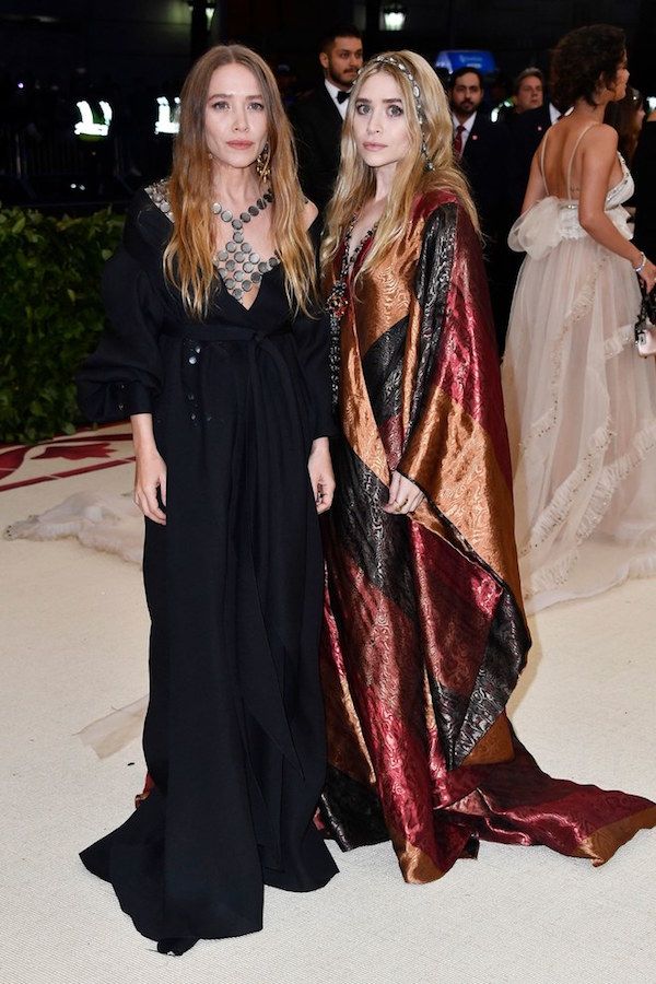 Olsens Anonymous Fashion Blog Mary Kate And Ashley Olsen Twins Met Gala 2018 Colorblock Gown Wrap Dress Embellished Neckline Necklace Headpiece Headband