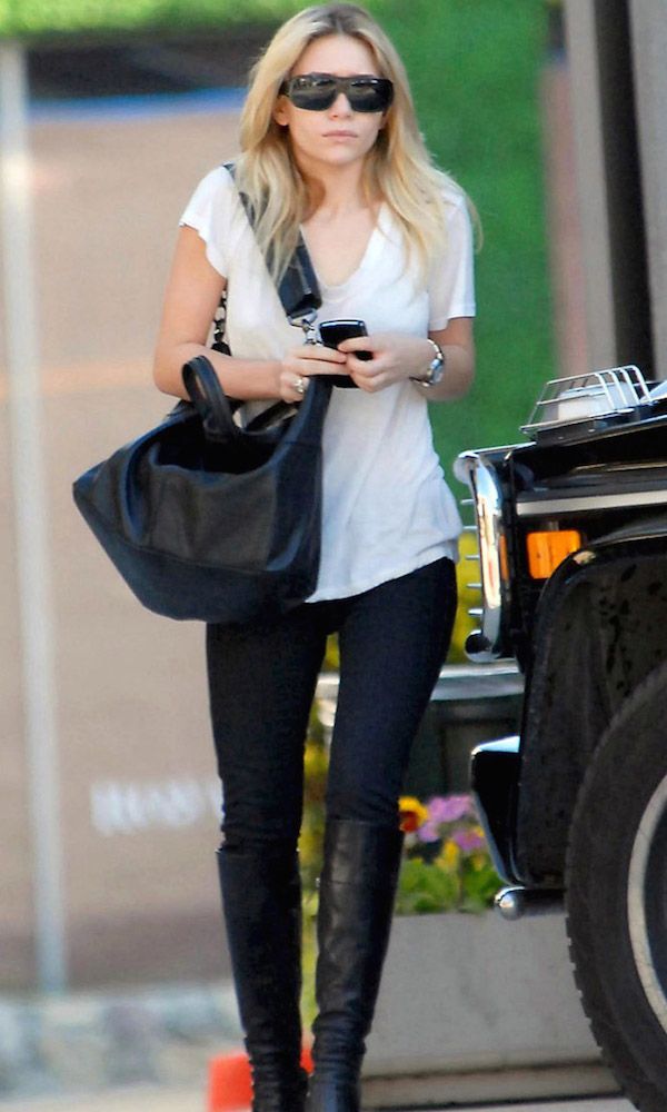Olsens Anonymous Blog Style Fashion Ashley Olsen Twins Knee High Boots Sunglasses White Tee Givenchy Bag Jeans Leather
